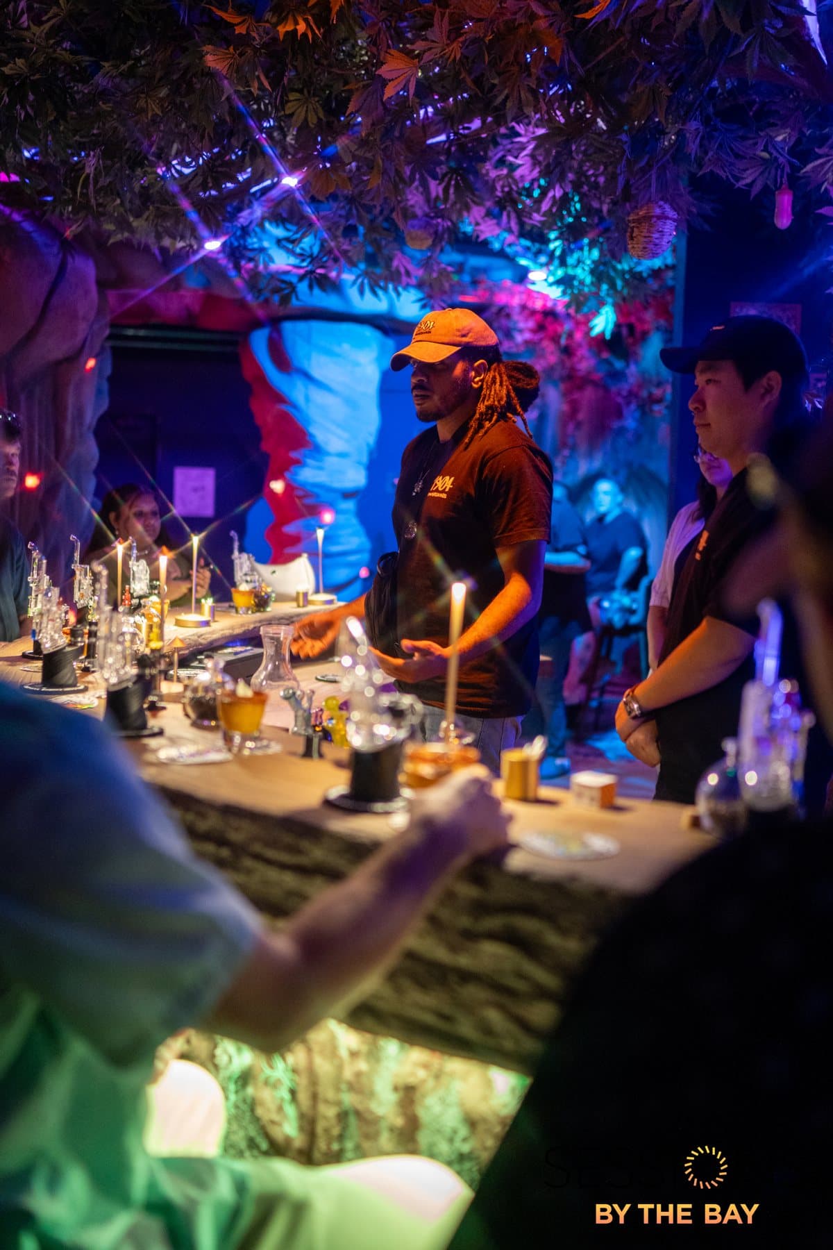 A host leading a hash rosin tasting at the Everburn Woods counter